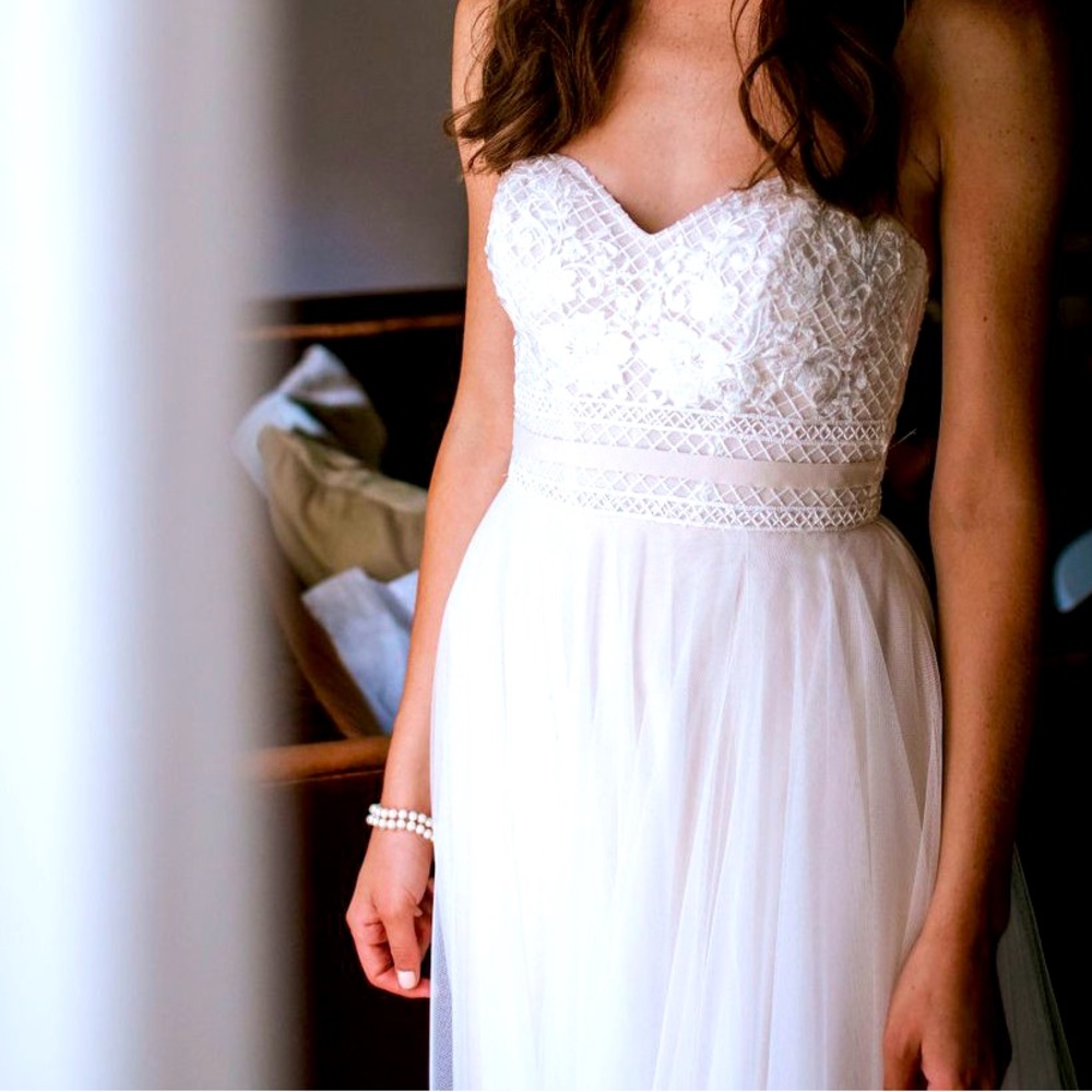 Wtoo wedding dress. Brand new. Never worn.